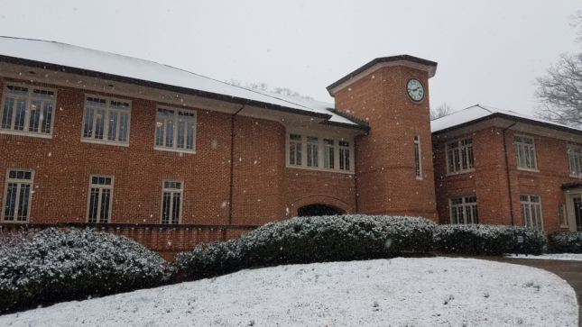 The Thomas J. Garland library building in winter with snow